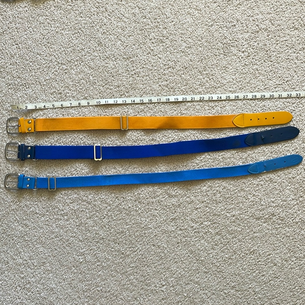 Softball / baseball belts. Three (one royal blue, one carolina blue, one gold)